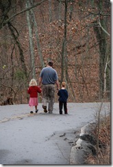 Father and children on a walk