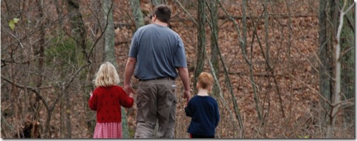 Father and children on a walk